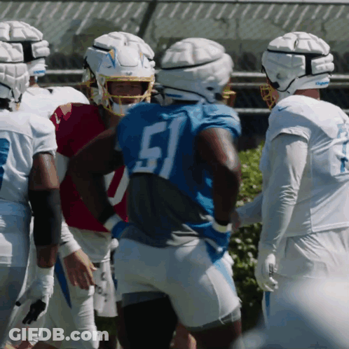 The Number 51 Is On The Back Of A Football Player 'S Jersey GIF