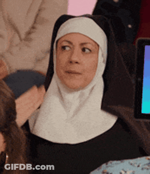 The Nun Fanning Her Hand Reaction GIF