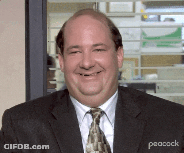 The Office Kevin Malone Snickering GIF