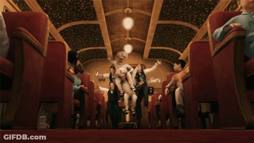 The Polar Express Conductor Dances With Waiters GIF