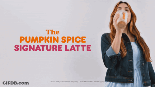 The Pumpkin Spice Signature Latte Is Being Poured Into A Clear Cup GIF