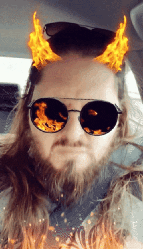 The Rock Eyebrow Raise Behind Fire Horn Filter GIF