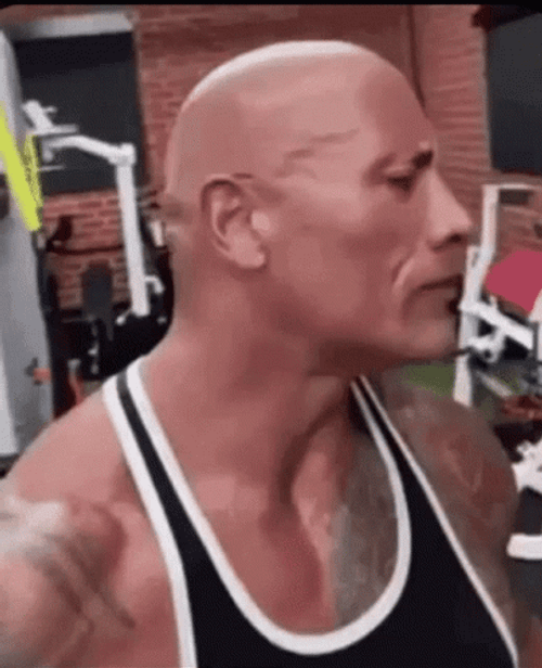 The Rock Eyebrow Raise Blue Eye Effect GIF