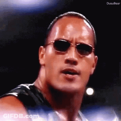 The Rock Eyebrow Raise WWE Lights Moment GIF