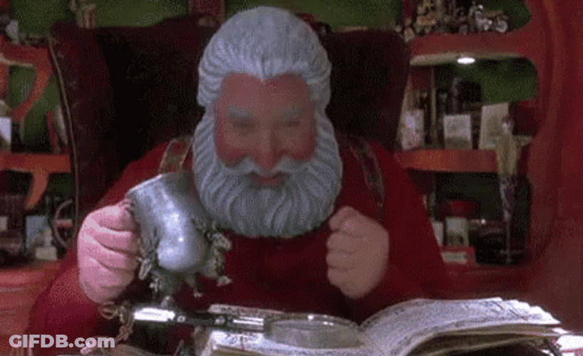 The Santa Clause Discusses Something GIF