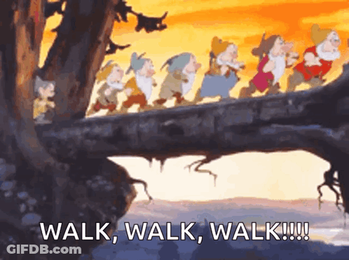 The Seven Dwarfs From Snow White And The Seven Dwarfs Walk Across A Tree Branch GIF