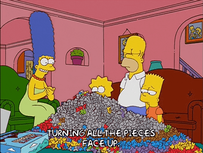 The Simpsons With Mountain Of Jigsaw Puzzle Pieces GIF