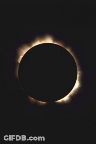The Sun Is Partially Obscured By The Moon During A Partial Solar Eclipse GIF