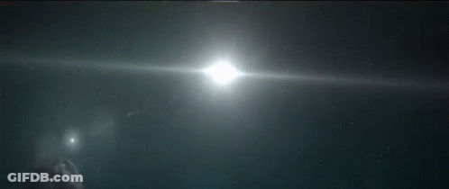 The Sun Is Shining Brightly Behind A Sphere In Space GIF