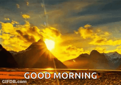 The Sun Is Shining Brightly Over The Mountains And The Words `` Good Morning '' Are Written Below It . GIF
