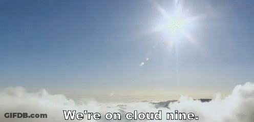 The Sun Is Shining Through The Clouds And The Words We 'Re On Cloud Nine Are Visible GIF