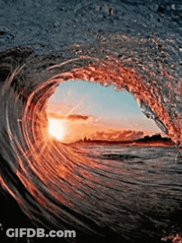 The Sun Is Shining Through The Hole In The Wave GIF