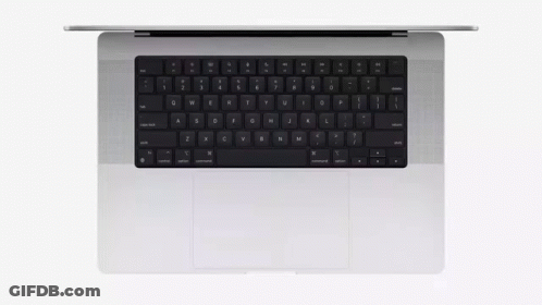 The Top Of A Silver Laptop With A Black Keyboard GIF