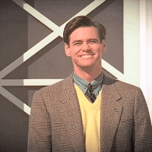 The Truman Show Truman Burbank Smiling Whle Pointing GIF