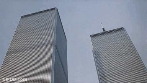 The Twin Towers Of The World Trade Center Are Shown From Below GIF