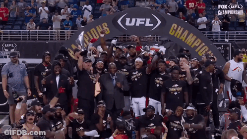 The Ufl Champions Are Celebrating In Front Of A Crowd GIF