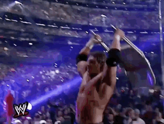 The Undertaker Choking Triple H GIF