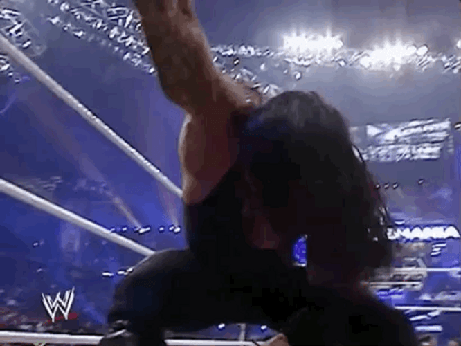 The Undertaker Flipping Hair GIF