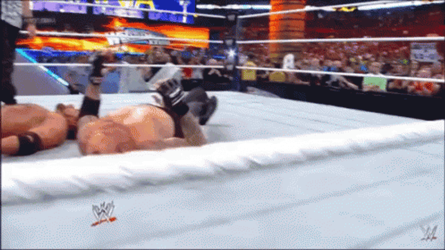 The Undertaker Lying Inside On Stage GIF