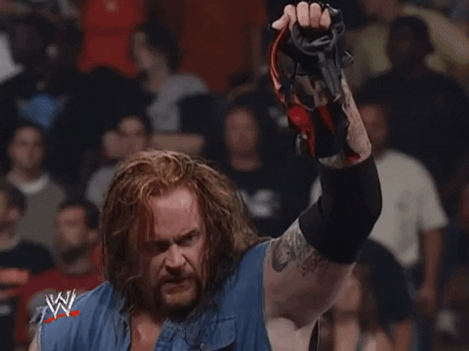 The Undertaker Raising The Mask GIF