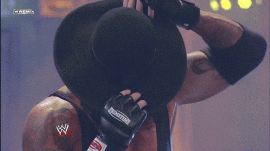 The Undertaker Removing Hat GIF