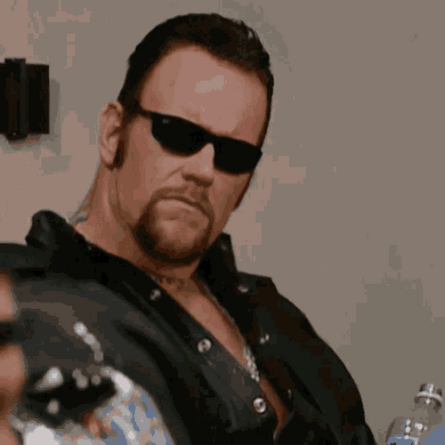 The Undertaker Removing Shade GIF