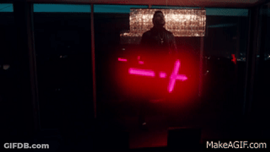 The Weeknd Holding Cross GIF