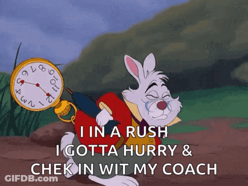 The White Rabbit From Alice In Wonderland Is Holding A Watch GIF