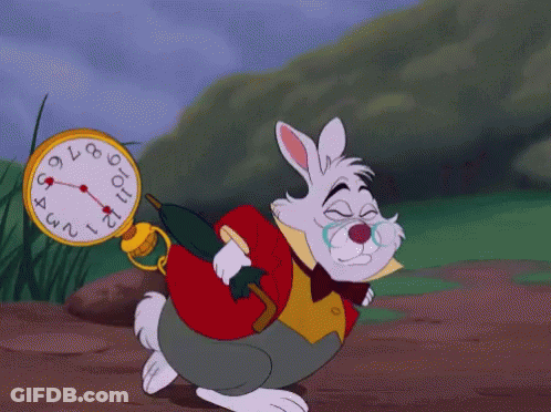 The White Rabbit From Alice In Wonderland Is Running With A Watch GIF