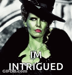 The Wicked Witch From Once Upon A Time Is Wearing A Top Hat And A Fur Coat And Necklace . GIF