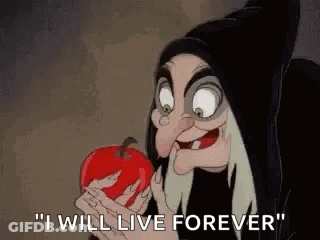 The Witch From Snow White And The Seven Dwarfs Is Holding A Red Apple In Her Hand And Saying `` I Will Live Forever '' . GIF