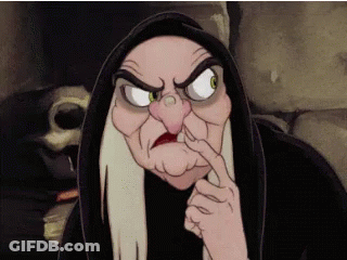 The Witch From Snow White And The Seven Dwarfs Is Wearing A Black Robe GIF
