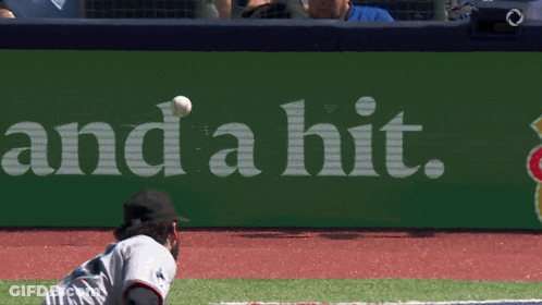 The Word And A Hit Is On A Green Sign GIF