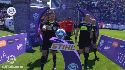 The Word Stihl Is On A Sign In The Middle Of The Field GIF