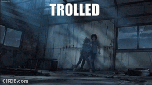 The Word Trolled Is On A Poster With Two People Fighting GIF