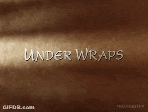 Under Wraps Text On Brown Background GIF