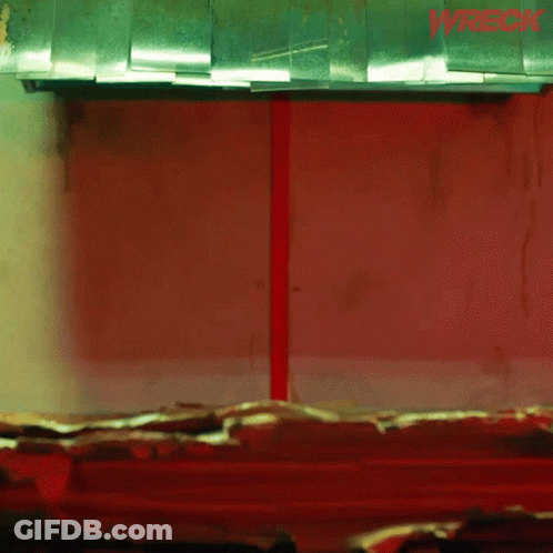 The Word Wreck That Is On A Red Wall GIF