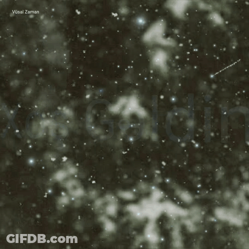 The Word Xos Is On A Dark Background With Snow GIF