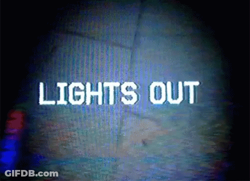 The Words Lights Out Are Displayed On A Dark Screen GIF