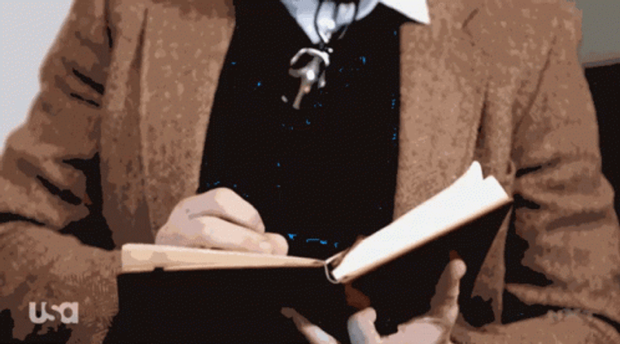 Therapist Kyle O Reilly Jotting Down Notes GIF