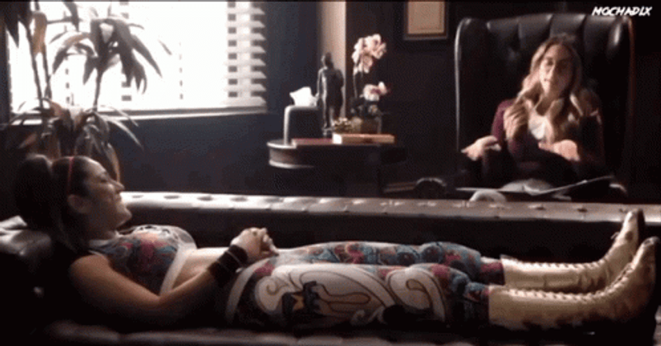 Therapist Talking To Patient Lying On A Sofa GIF