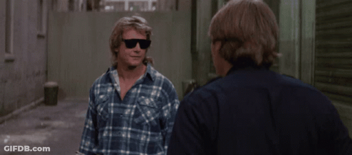 They Live Movie Roddy Piper Talking GIF