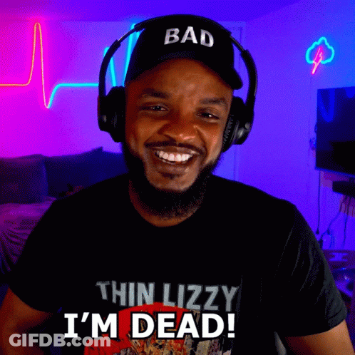 Thin Lizzy Fan With Headphones Saying I'm Dead GIF