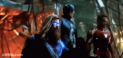 Thor , Captain America , And Iron Man Are Standing Next To Each Other In A Room . GIF