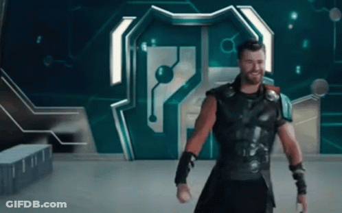 Thor Is Standing In Front Of A Door With The Letter P On It . GIF