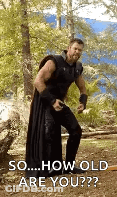 Thor Standing In Woods Holding Sword Asking How Old Are You GIF