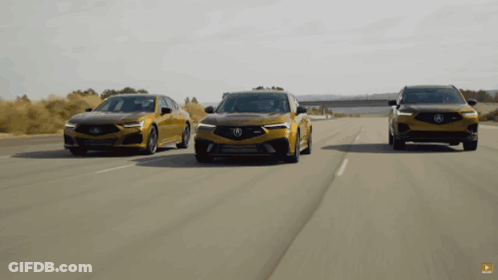 Three Acura Cars Are Driving Down A Highway GIF