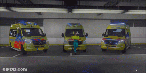 Three Ambulance Vans Parked With License Plate Starting With Z GIF