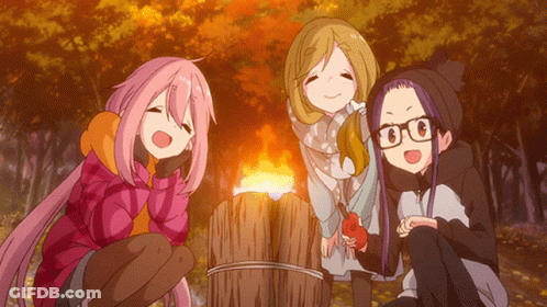 Three Anime Girls Are Sitting Around A Campfire In The Woods GIF