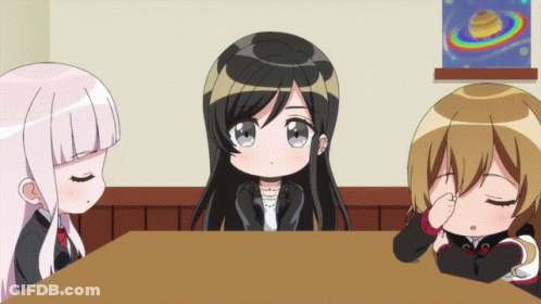 Three Anime Girls Are Sitting At A Table With One Covering Her Eyes GIF